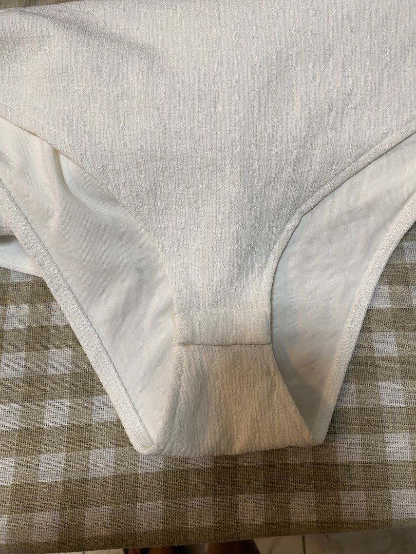 H&M White One-Shoulder Ruffle Bodysuit Size S (Category: Others Tops) located in Cavite. Submitted by yc.shoppemnl (Listing ID 1462788947, Image 3). Description: White one-shoulder bodysuit from H&M. Features a ruffled detail on the shoulder. Made with a polyester and elastane blend. Perfect for layering or wearing on its own. Comfortable and stylish. Size S. Pretty in actual.