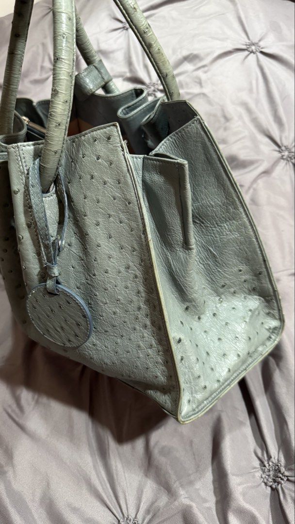 Hormiga Ostrich Leather Tote (Category: Tote Bags) located in Cebu City. Submitted by claclax28 (Listing ID 1462698460, Image 2). Description: - Genuine grey ostrich leather tote bag - Comfortable round top handles - Secure interior zipper closure - Attached small circular leather tag - Ideal for everyday use - Spacious interior for all your essentials -payment thru BDO or Gcash, price slightly nego rfs: not used often .