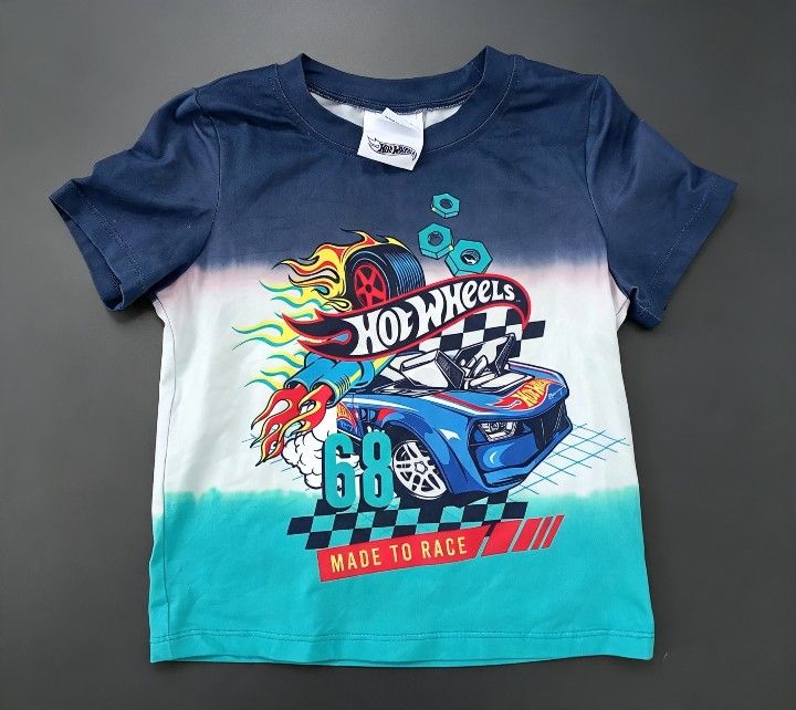Hot Wheels "68 Made to Race" T-Shirt (Category: Babies & Kids Fashion) located in Baguio. Submitted by miishaysh67446 (Listing ID 1461663127, Image 3). Description: - Cool Hot Wheels t-shirt for kids - Eye-catching blue and white tie-dye design - Features a dynamic graphic with a race car, flames, and '68 Made to Race' slogan - Comfortable blend of polyester and spandex - Ideal gift for any young Hot Wheels enthusiast.