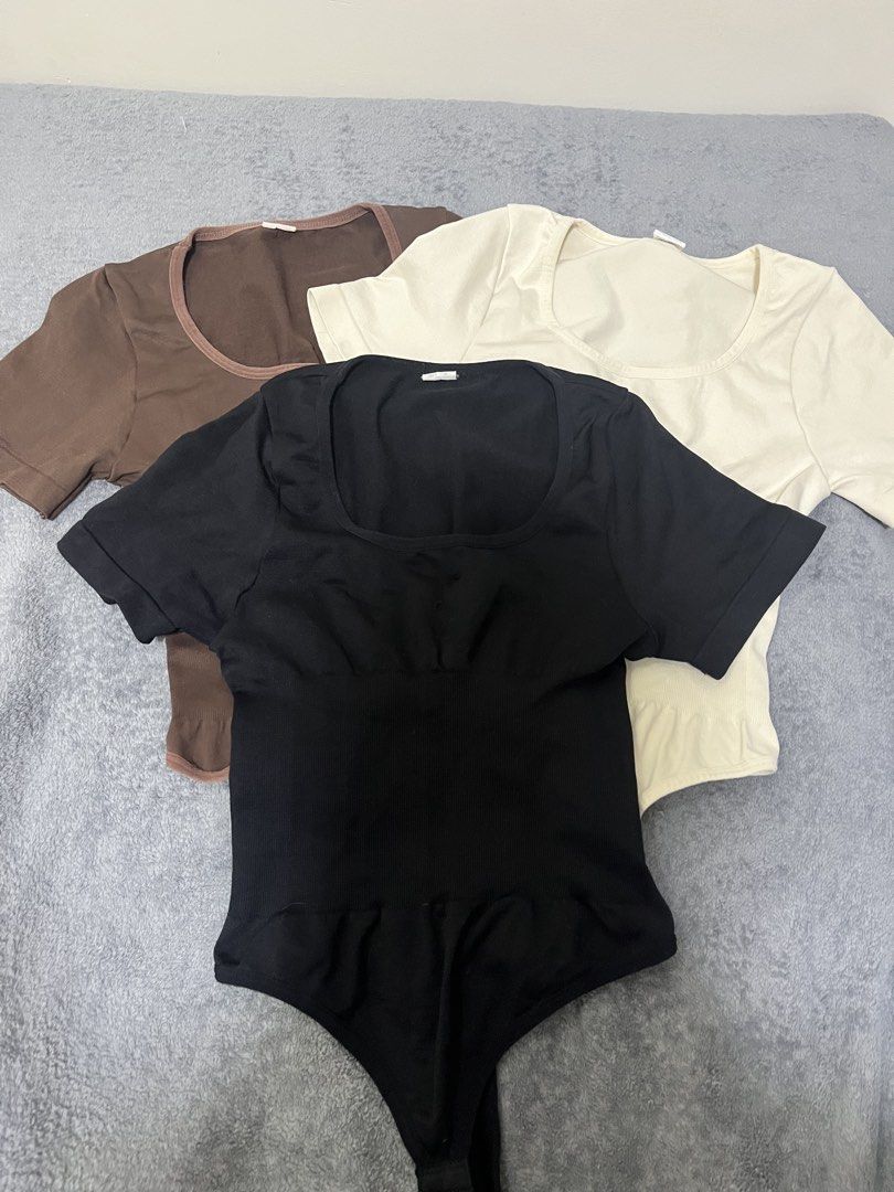 Hottie Diary Square Neck Short Sleeve Bodysuits (Category: Others Tops) located in Taguig. Submitted by pzpd9h_ (Listing ID 1462884682, Image 1). Description: - Size XXS - S - Set of 3 short-sleeved bodysuits - Colors: Black, Brown, Cream - Flattering square neckline - Comfortable thong bottom with snap closure - Stretchy material for a great fit - Perfect for layering or wearing solo - ₱90 each, take all for ₱250.