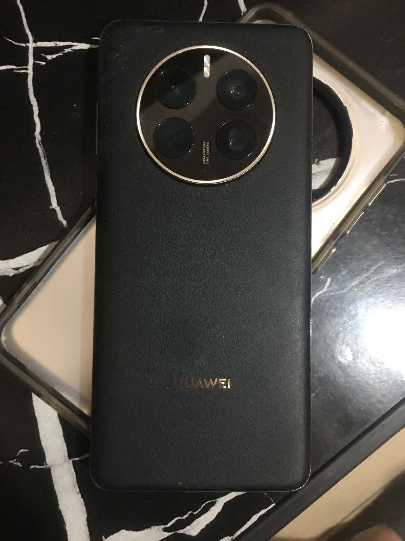 HUAWEI MATE 50 PRO (Category: Huawei) located in Manila. Submitted by nolimit0 (Listing ID 1462874414, Image 2). Description: for sale only mate 50 pro with box with adaptor for sale only issue : power buton stuck , volume down stuck.