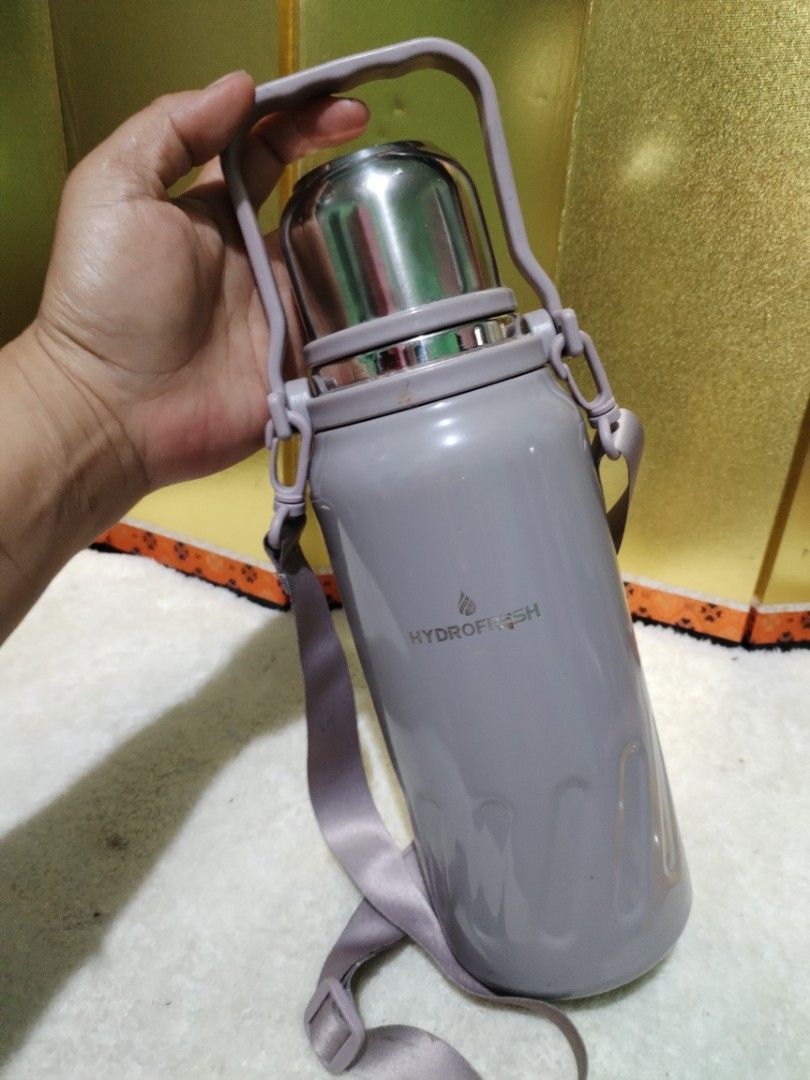 Hydrofresh Insulated Water Bottle with Strap (Category: Water Bottles & Tumblers) located in Manila. Submitted by malditas (Listing ID 1462827907, Image 3). Description: - Brand: Hydrofresh - Color: Grey - Type: Insulated Water Bottle - Features: Easy-carry strap, lid with strainer - Functionality: Keeps drinks hot or cold - Condition: Great - Contact: Message me if interested! From HT box BUY AS IS (NO RETURN, NO EXCHANGE, NO REFUND unless state