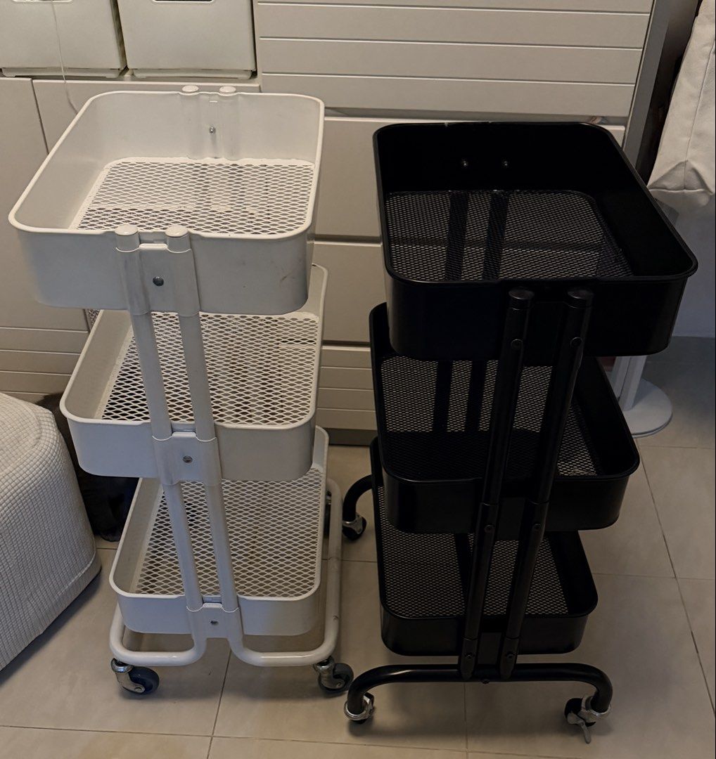 IKEA RASKOG Trolley - White & Black （分類：櫃子、組合櫃及置物架）位於 Hong Kong。 由 davidadamsoloman 提交（商品編號 1462723161，圖片 2）。簡介： Selling a white IKEA RASKOG trolley. Great for storage in any room. It has three tiers and wheels for easy movement. Dimensions are 35x45x78 cm. Some minor signs of use on the bottom shelf, please check photos. Still very functional.。