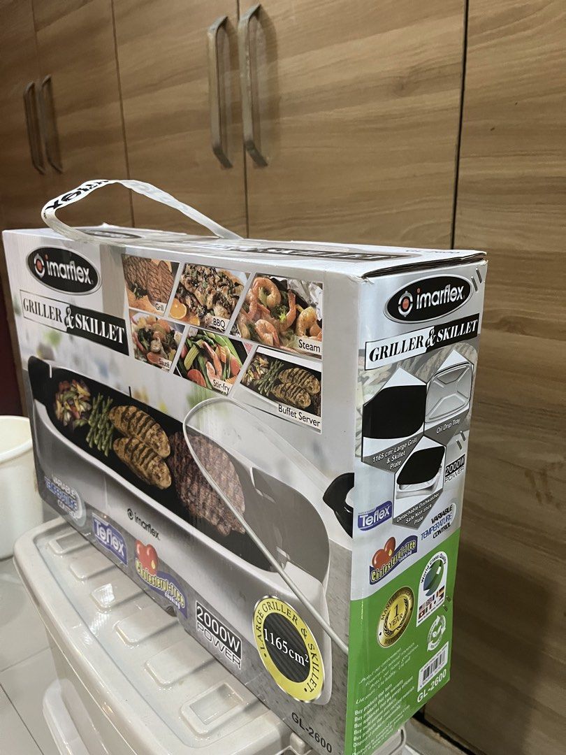Imarflex Griller & Skillet GL-2600 2000W (Category: Cookware & Accessories) located in Manila. Submitted by jericho_chan (Listing ID 1462722173, Image 3). Description: - Imarflex Griller & Skillet: Perfect for grilling, BBQ, stir-fry, and more. - Large Grilling Surface: 1165cm² for ample cooking space. - Teflex Coating: Ensures non-stick performance. - Variable Temperature Control: Adjust heat for perfect results. - Powerful 2000W: Heats up quick