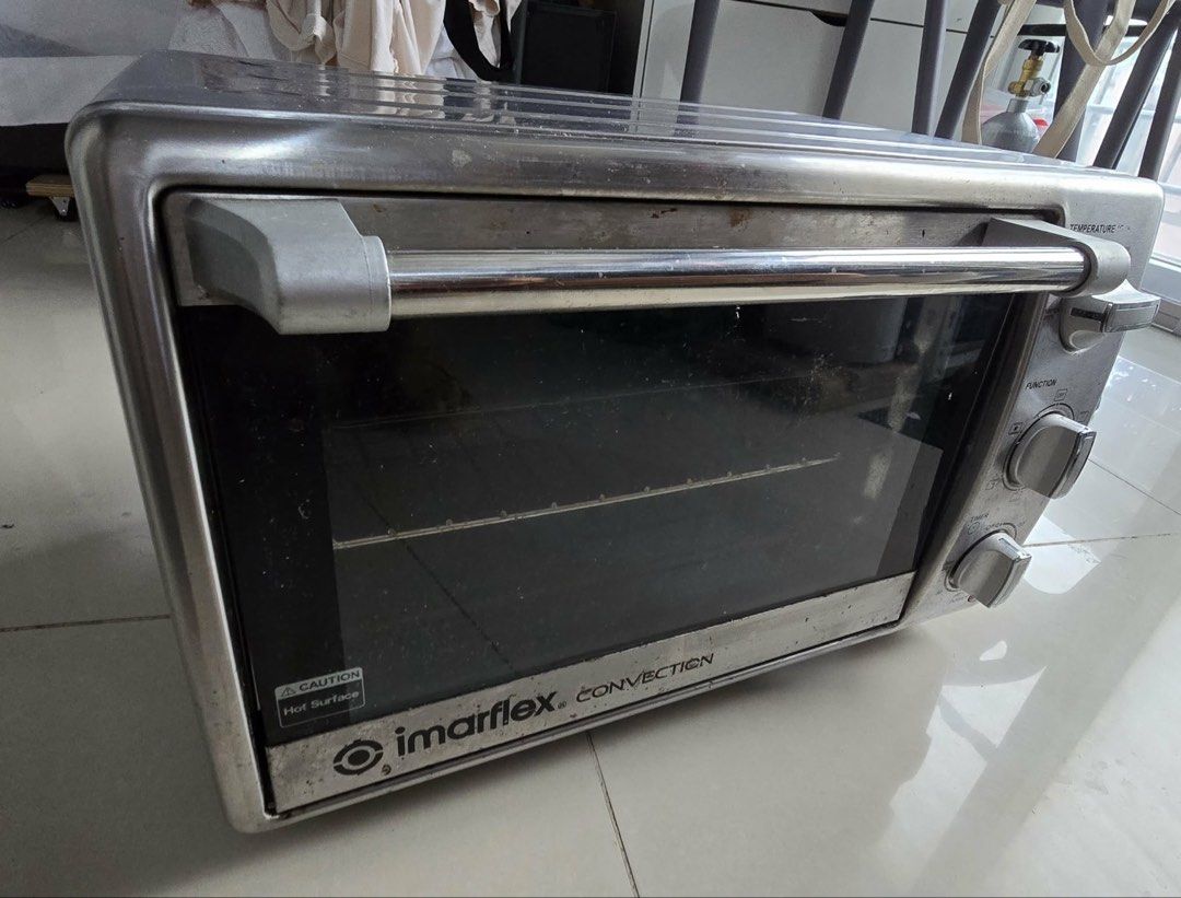 Imarflex IT-210CS Convection Oven 1380W (Category: Ovens & Toasters) located in Manila. Submitted by jhie24 (Listing ID 1462869097, Image 2). Description: Negotiable!!! - Imarflex Convection Oven IT-210CS - Powerful 1380W heating element - Versatile: Great for baking, roasting, and toasting - Compact design, perfect for small kitchens - Easy-to-use controls: Temperature, Function, and Timer - Selling as part of a kitchen upgrade.