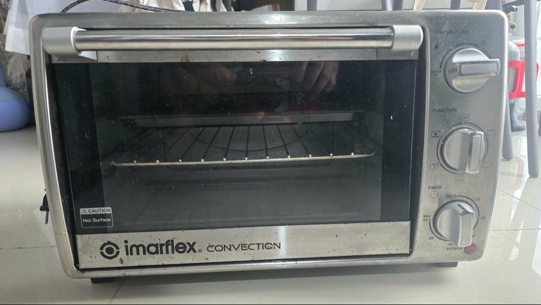 Imarflex IT-210CS Convection Oven 1380W (Category: Ovens & Toasters) located in Manila. Submitted by jhie24 (Listing ID 1462869097, Image 1). Description: Negotiable!!! - Imarflex Convection Oven IT-210CS - Powerful 1380W heating element - Versatile: Great for baking, roasting, and toasting - Compact design, perfect for small kitchens - Easy-to-use controls: Temperature, Function, and Timer - Selling as part of a kitchen upgrade.