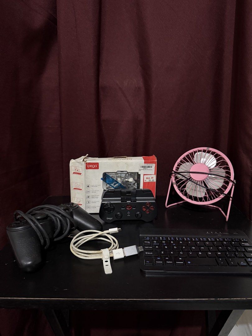 iPega Controller, Bluetooth Keyboard, Fan & more (Category: Controllers) located in Caloocan City. Submitted by rohllee (Listing ID 1462730609, Image 1). Description: - iPega Controller - Bluetooth Controller SOLD - Mini USB Keyboard - Pink USB Fan - Charging Cables Included - USB Dongle Included Selling as bundle for 399.