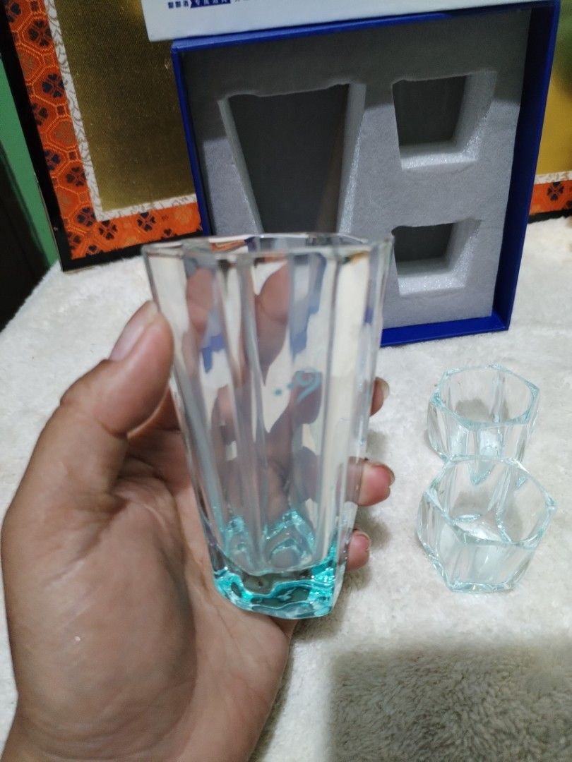 Japanese Style Hexagonal Glassware Set (Category: Other Kitchenware & Tableware) located in Manila. Submitted by malditas (Listing ID 1462829546, Image 3). Description: - Beautiful hexagonal glassware set - Includes 1 large glass and 2 smaller shot glasses - Made of clear glass with a subtle blue tint at the base - Comes in original packaging with protective foam - Great for sake or other spirits - Unique geometric design From HT box BUY AS IS (N