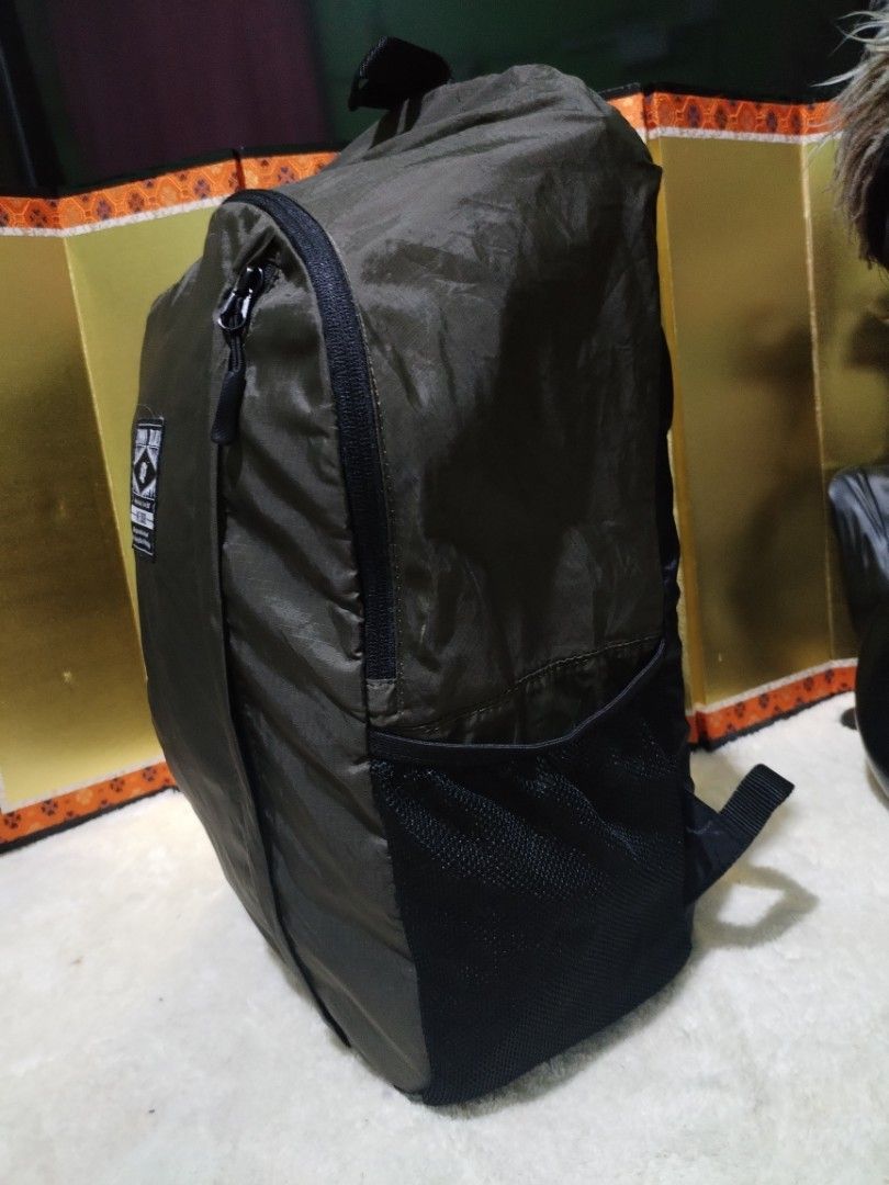 Jimmy Black Packable Travel Backpack (Category: Backpacks) located in Manila. Submitted by malditas (Listing ID 1462828920, Image 3). Description: - Olive green packable travel backpack - Lightweight and easy to fold - Main zippered compartment - Front zippered pocket - Side mesh pockets for water bottles - Adjustable shoulder straps - Ideal for trips or everyday use From HT box BUY AS IS (NO RETURN, NO EXCHANGE, NO REFUND unless stated) LOCATION