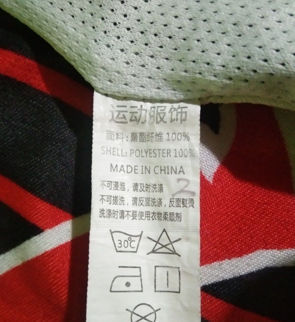 Jordan Reversible Basketball Jersey (Category: Activewear) located in Quezon City. Submitted by aljonbermu25659 (Listing ID 1462704132, Image 3). Description: - Reversible Jordan basketball jersey - Side 1: White with black Jumpman logo - Side 2: Black with white Jumpman logo - Material: 100% Polyester - Ideal for basketball or casual wear.