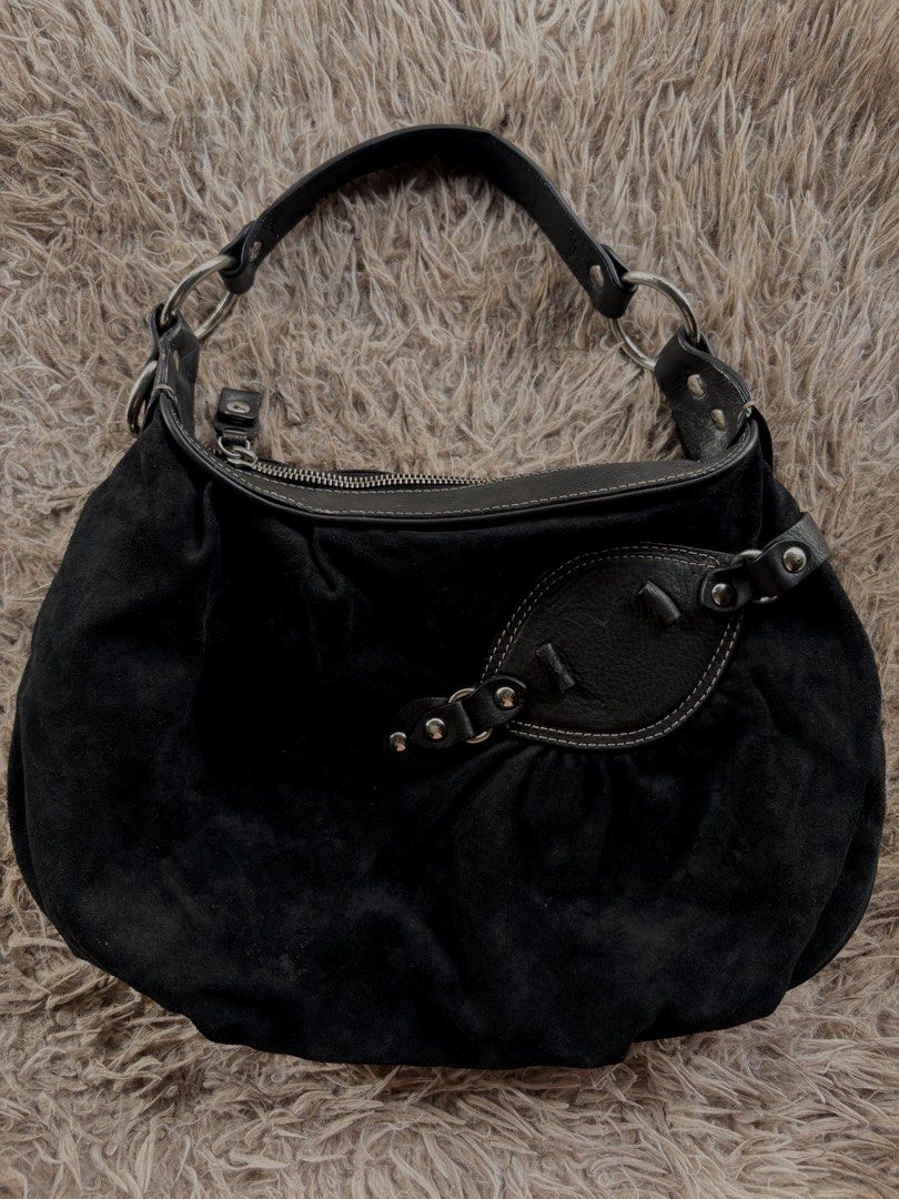 Juicy Couture Bag (Category: Shoulder Bags) located in Tarlac. Submitted by alxssmrcs_ (Listing ID 1462787917, Image 1). Description: Front hardware: one small piece missing (as shown) .