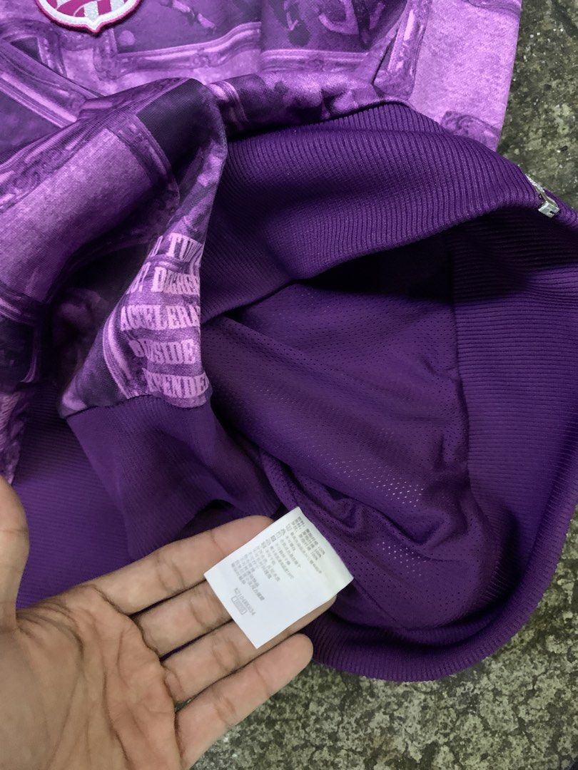 Kappa Purple All-Over Print Track Jacket Large (Category: Coats, Jackets and Outerwear) located in Manila. Submitted by thrift2mnla (Listing ID 1462812202, Image 3). Description: - Authentic Purple Kappa Track Jacket - Unique All-Over Print Design - Full Zip Closure - Ribbed Collar, Cuffs, and Hem for a Comfortable Fit - Size: Large (L) - Ideal for Casual Wear and Street Style.