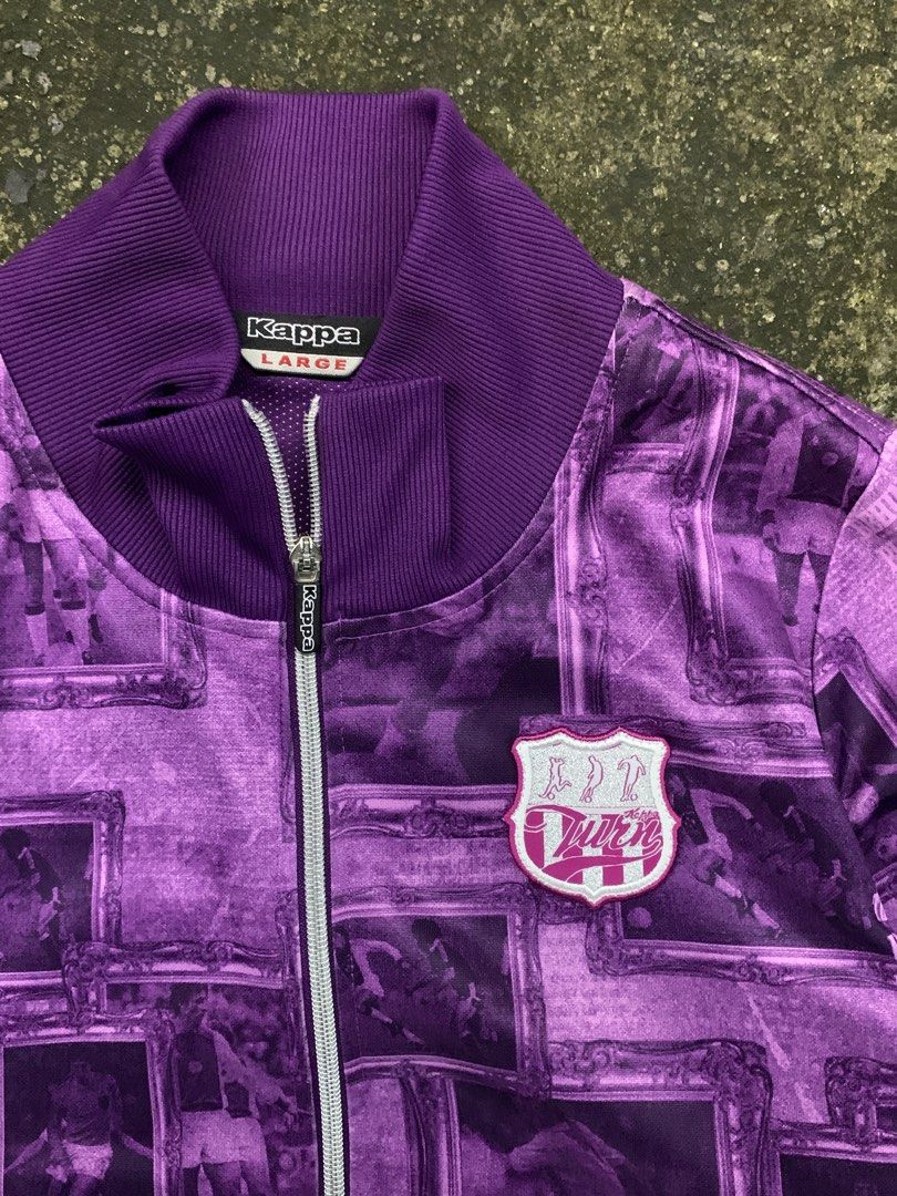 Kappa Purple All-Over Print Track Jacket Large (Category: Coats, Jackets and Outerwear) located in Manila. Submitted by thrift2mnla (Listing ID 1462812202, Image 1). Description: - Authentic Purple Kappa Track Jacket - Unique All-Over Print Design - Full Zip Closure - Ribbed Collar, Cuffs, and Hem for a Comfortable Fit - Size: Large (L) - Ideal for Casual Wear and Street Style.
