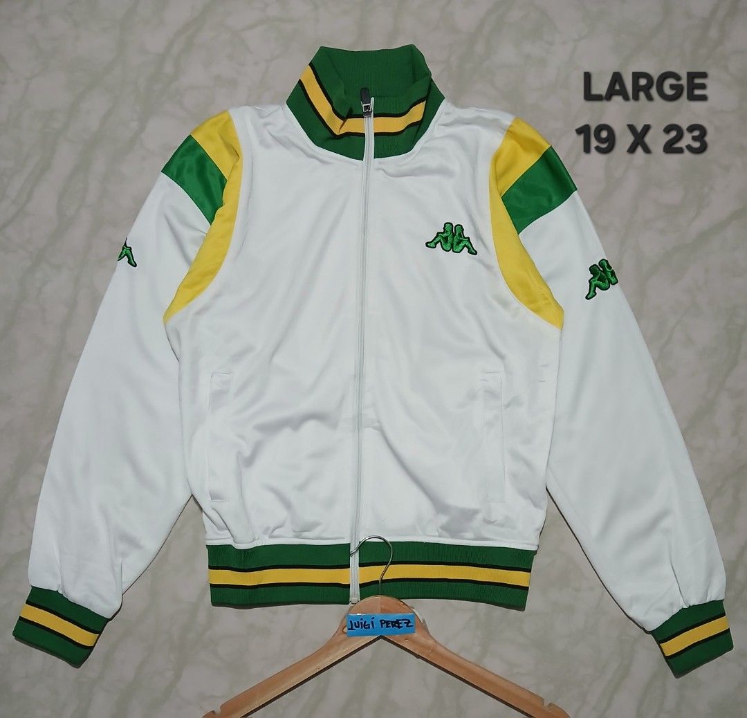 Kappa White Green Yellow Track Jacket Size Large (Category: Coats, Jackets and Outerwear) located in Plaridel. Submitted by igieperez147282 (Listing ID 1462843293, Image 1). Description: - White Kappa track jacket - Green and yellow accent details - Kappa logo on chest and back - Ribbed collar, cuffs, and hem - Full zip closure - Ideal for casual wear or sports.