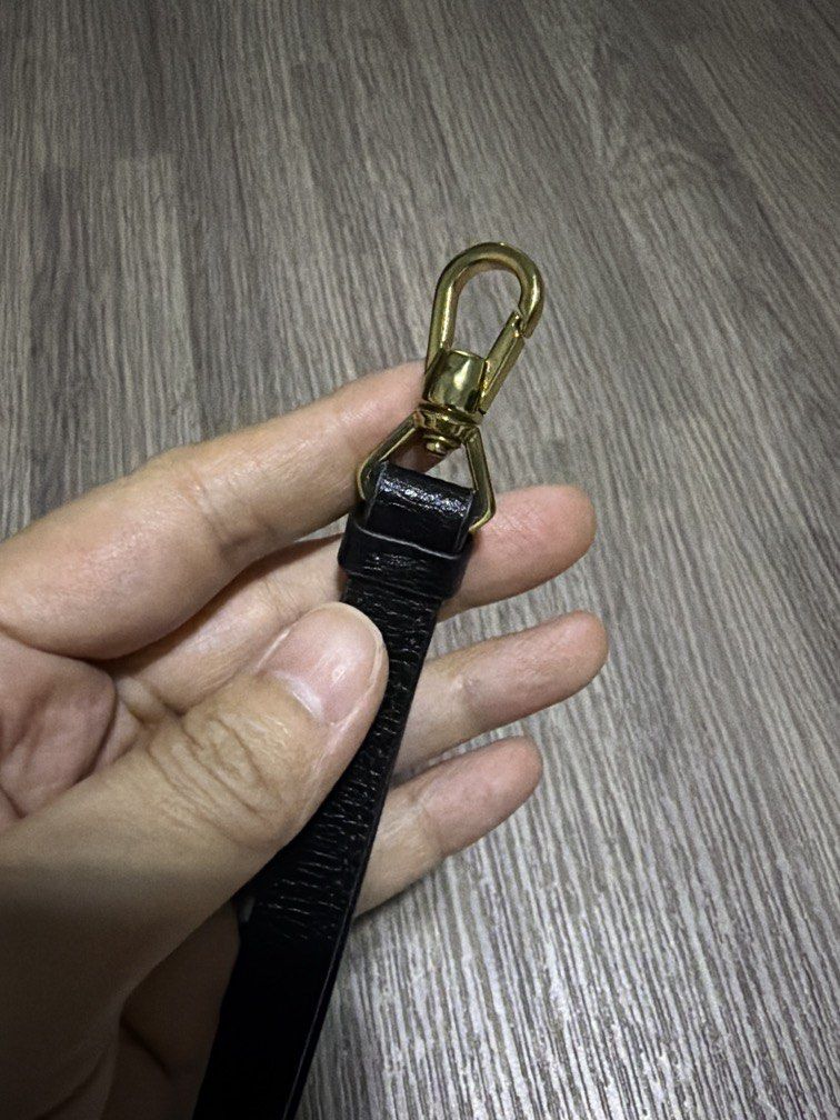 Karl Lagerfeld Wristlet Strap (Category: Wallets & Card holders) located in Quezon City. Submitted by littlegabu_treasures (Listing ID 1462815705, Image 3). Description: This is the strap included in the Karl Lagerfeld wallet. Can be used as a replacement wristlet strap to your wallet, etc. I am not fond of using wristlet strap hence, selling. This is genuine leather..