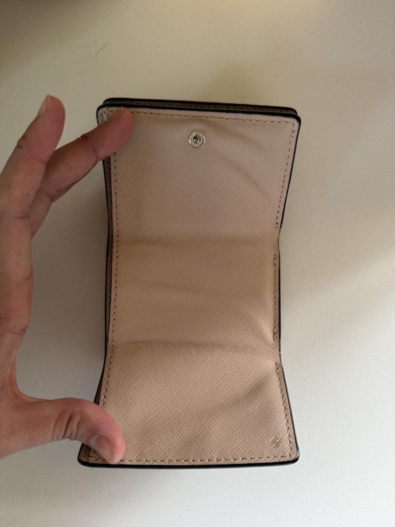 Kate Spade Black Leather Trifold Wallet (Category: Wallets & Card holders) located in Angeles City. Submitted by decluttering.kimmmyyy (Listing ID 1462724241, Image 2). Description: Kate Spade Trifold Wallet Still in good condition Rfs: Decluttering.