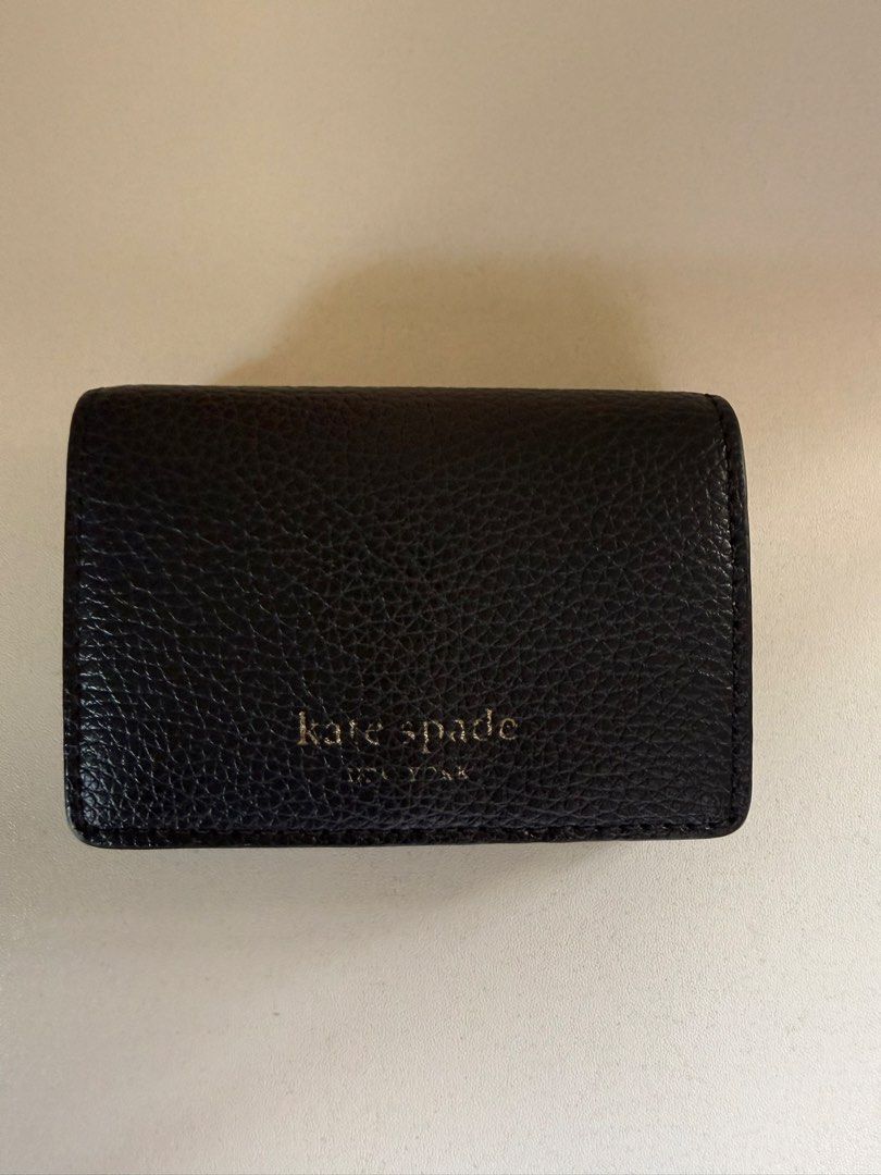Kate Spade Black Leather Trifold Wallet (Category: Wallets & Card holders) located in Angeles City. Submitted by decluttering.kimmmyyy (Listing ID 1462724241, Image 1). Description: Kate Spade Trifold Wallet Still in good condition Rfs: Decluttering.