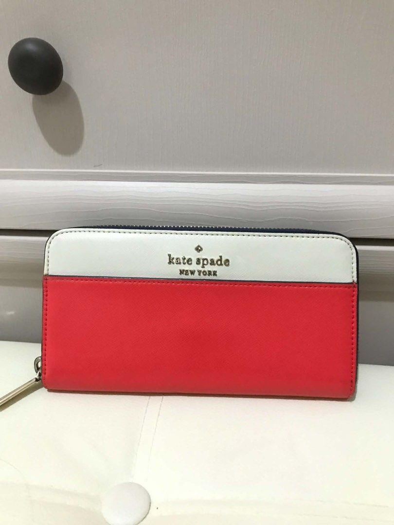 Kate Spade Long Wallet - Multiple Colors Available (Category: Wallets & Card holders) located in Manila. Submitted by hearthearty (Listing ID 1462838660, Image 3). Description: Pm for individual pricing - Genuine leather Kate Spade zip around wallets - Available colors: navy/beige, red/white/black, black/beige - Comes with care card and box (selected item) - Ideal for organizing your essentials.