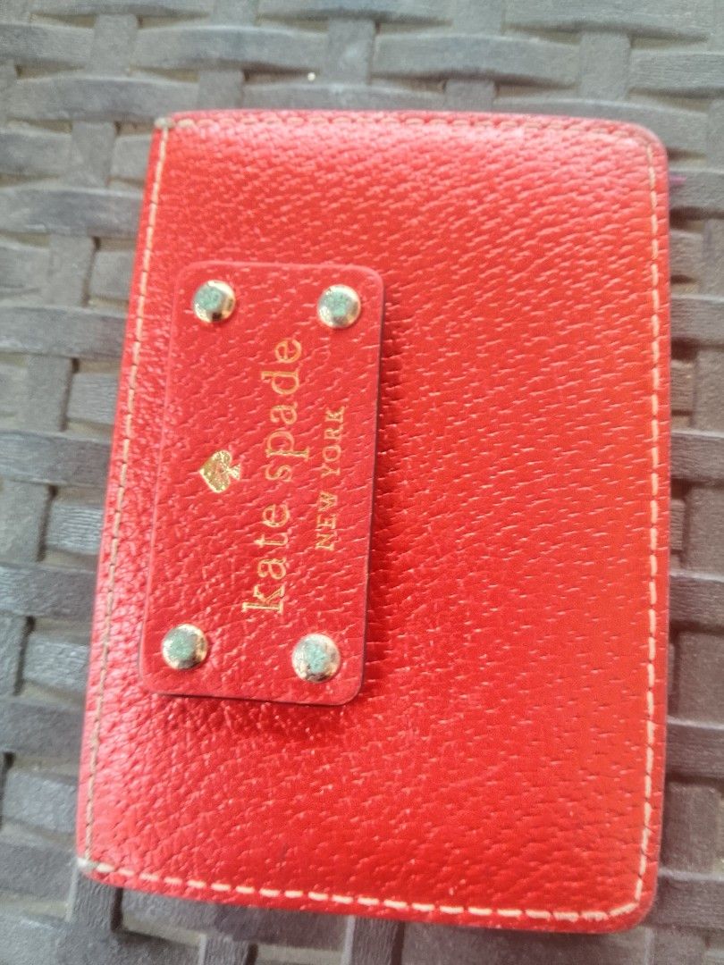 2k for lv and kate spade (Category: Wallets & Card holders) located in Cagayan de Oro. Submitted by brex7 (Listing ID 1462711001, Image 1). Description: - Authentic Red Kate Spade Card Holder - Genuine Leather - Features classic spade logo and New York detail - Light cream interior with multiple card slots - Interior shows some signs of use - Ideal for keeping cards organized.