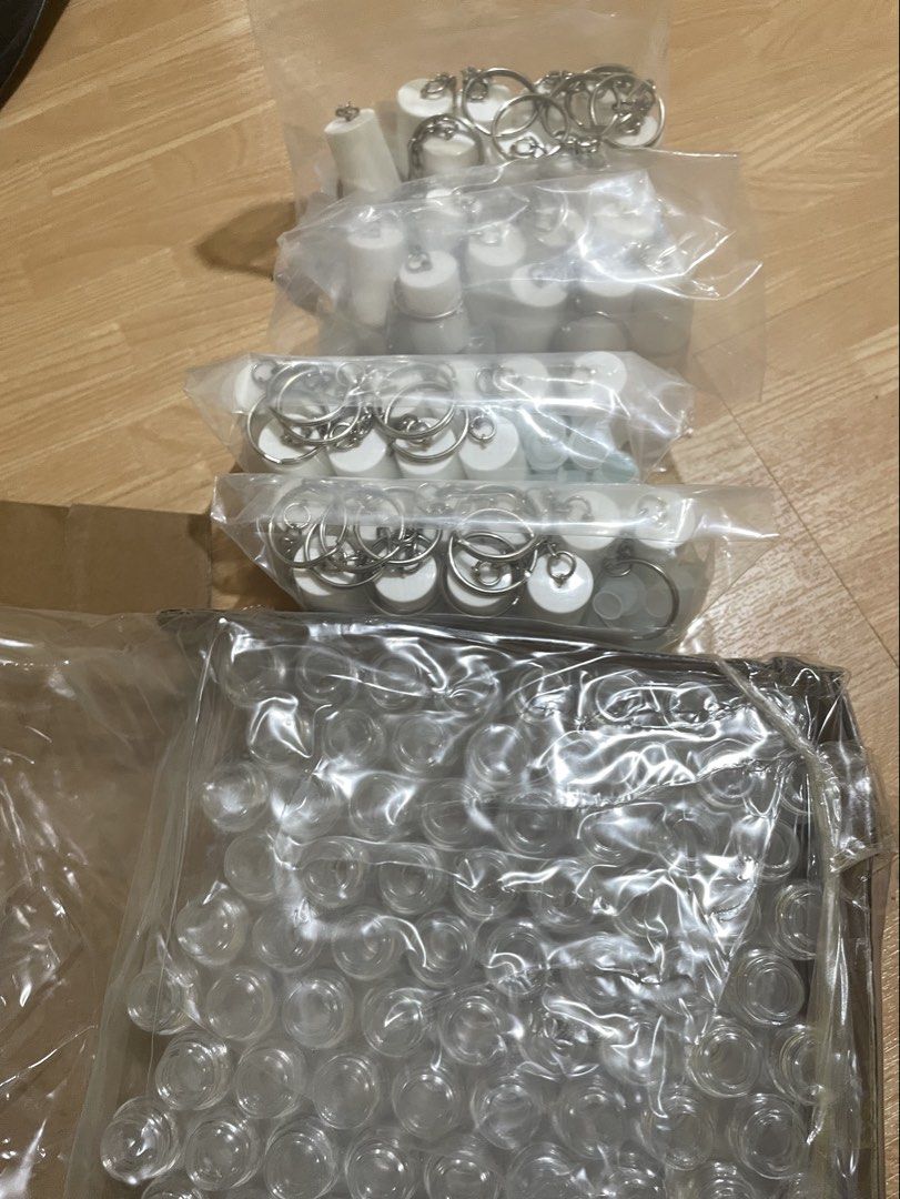 Keychain Roller Bottles Bulk Essential Oil Roller Bottles with Keychains and Caps (Category: Medical Supplies & Tools) located in Infanta. Submitted by frandez (Listing ID 1462762359, Image 1). Description: - Bundle of small glass roller bottles - Comes with white caps and attached keychains - Includes extra clear plastic caps - Ideal for DIY essential oil blends and perfumes - Plenty of bottles for your projects 125 pieces.