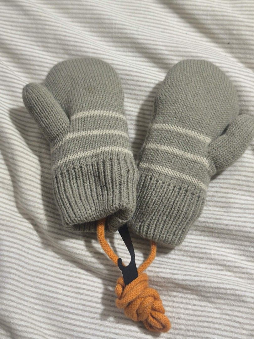 Kids Fox Mittens with String (Category: Babies & Kids Fashion) located in Taguig. Submitted by juliestjuly (Listing ID 1462859361, Image 2). Description: - Adorable grey knitted mittens for children. - Features a cute little fox face design on each mitten. - Comes with a connecting string to keep them together and prevent loss. - Ideal for keeping little hands warm during cold weather. - Easy for kids to put on and take off..