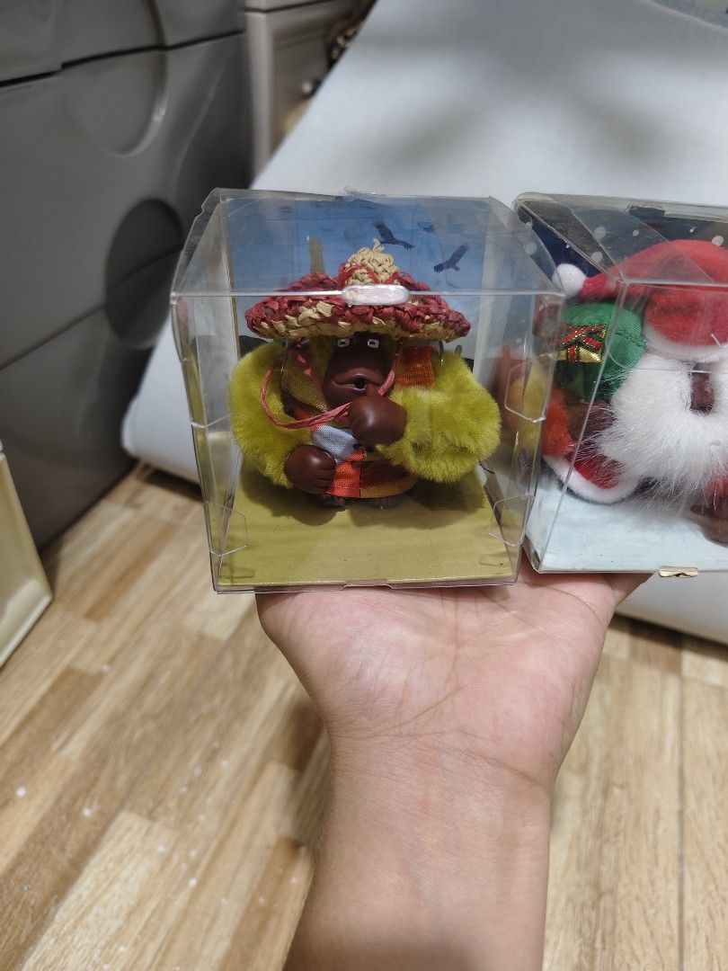 Kipling Bag Charm or Keychain (Category: Other Home Decor) located in Makati City. Submitted by abegailbrezuela (Listing ID 1462783259, Image 2). Description: - Set of 2 Kipling Bag Charm or Keychain - Includes classic Santa Claus with gift sack - Includes fun character with straw hat and yellow scarf - Both Bag Charm or Keychain are in their original clear plastic boxes - Makes a great festive gift - 850 each.