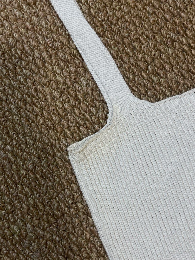 Knit Tank Top (cream) (Category: Sleeveless) located in Pasig City. Submitted by miafml-closet-cleanout (Listing ID 1462771357, Image 3). Description: - i used to wear this top SO MUCH haha - super nice fabric! doesn't hug your bilbil hehe - flaw/s: yellowish discoloration sa underarm part posted price is fixed ♡ will not respond to hagglers. 💵 mop: gcash / bdo / maribank / unionbank 🛵 courier: any as long as arranged by buyer 🙅🏻‍♀️ no reques