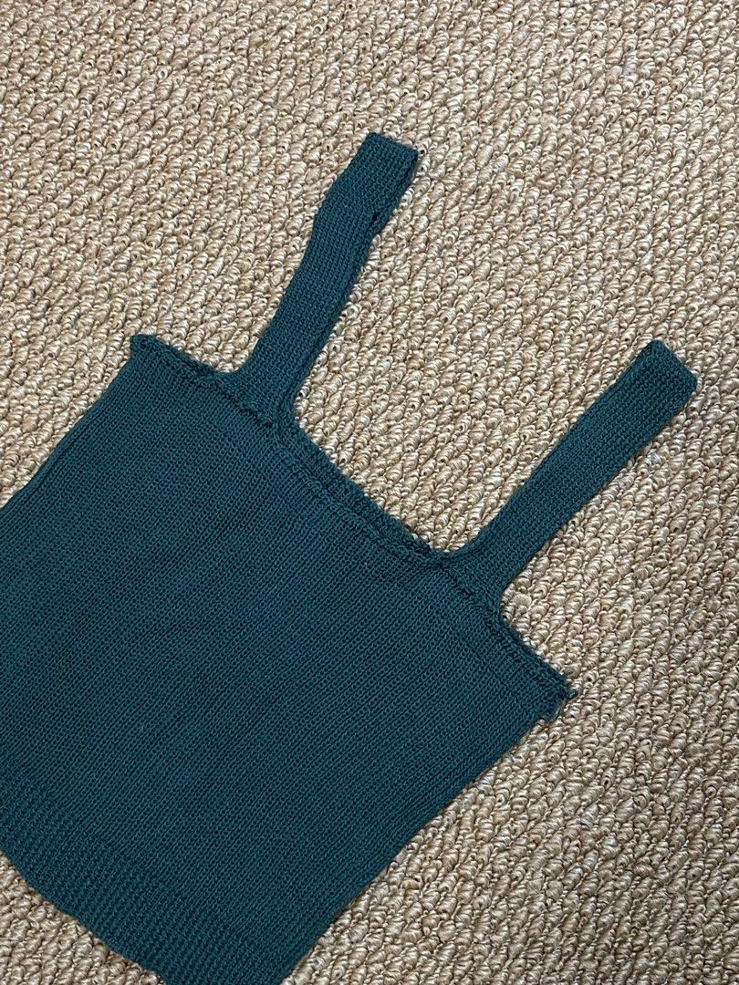 Knit Tank Top (dark teal) (Category: Sleeveless) located in Pasig City. Submitted by miafml-closet-cleanout (Listing ID 1462777844, Image 1). Description: - nice knitted fabric - fits small / petite frames - flaw/s: loose thread/stitching sa underarm part.