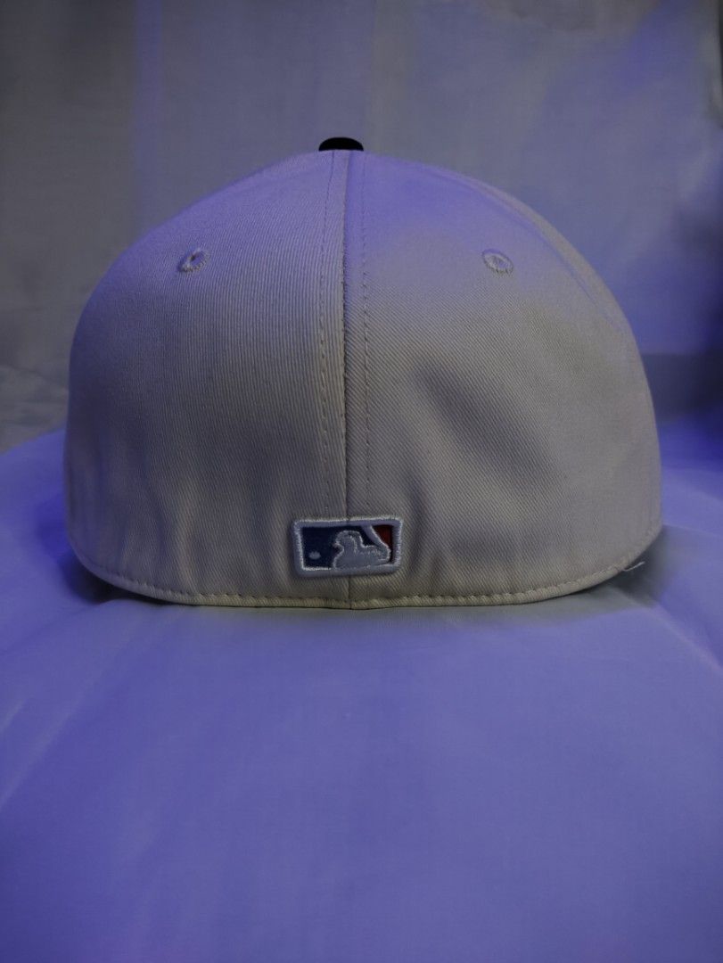 LA Dodgers Snapback Cap - Dodger Stadium 60th Anniversary (Category: Caps & Hats) located in Manila. Submitted by vestige_collection (Listing ID 1462863979, Image 3). Description: - LA Dodgers snapback hat - Cream colored crown with red 'LA' logo - Black brim - Special patch: Dodger Stadium 60th Anniversary (1962-2022) - MLB logo on the back - Adjustable snapback closure - Size: 7 1/8.