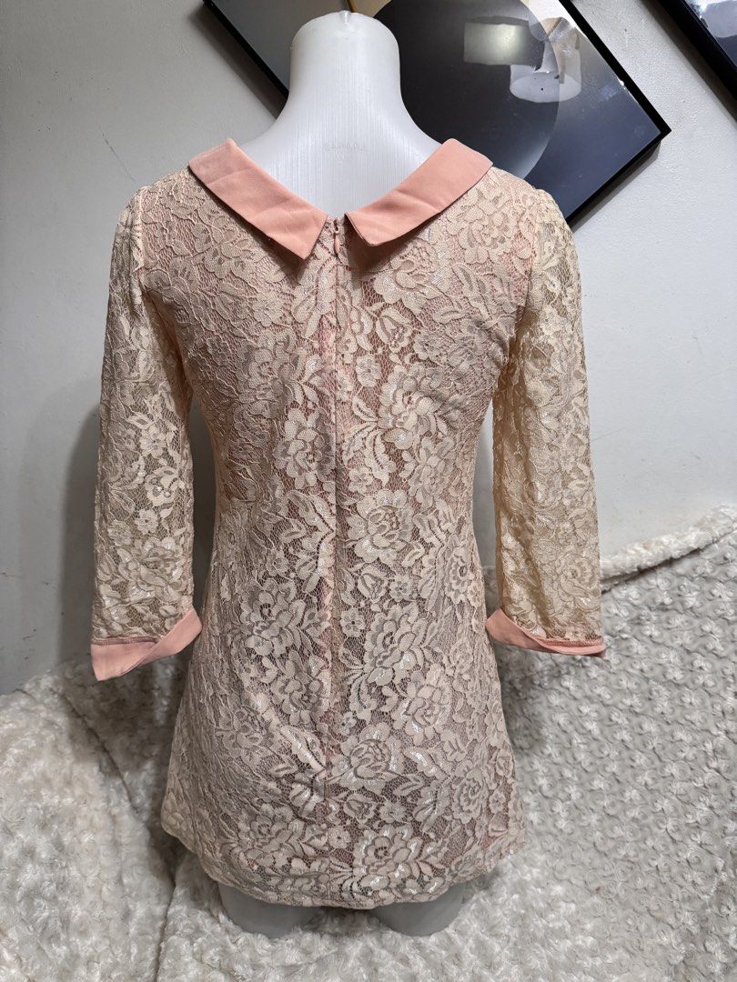 Lace Peter Pan Collar Dress (Category: Dresses) located in Marikina City. Submitted by lorradel (Listing ID 1462699662, Image 3). Description: - Adorable floral lace dress - Features a charming pink Peter Pan collar - Three-quarter sleeves with pink cuffs - Convenient back zipper closure - Versatile for both casual outings and dressier occasions - MAY HAVE some washable stains (hindi maiiwasan) needs washing; had been stored - mannequin size 34-2