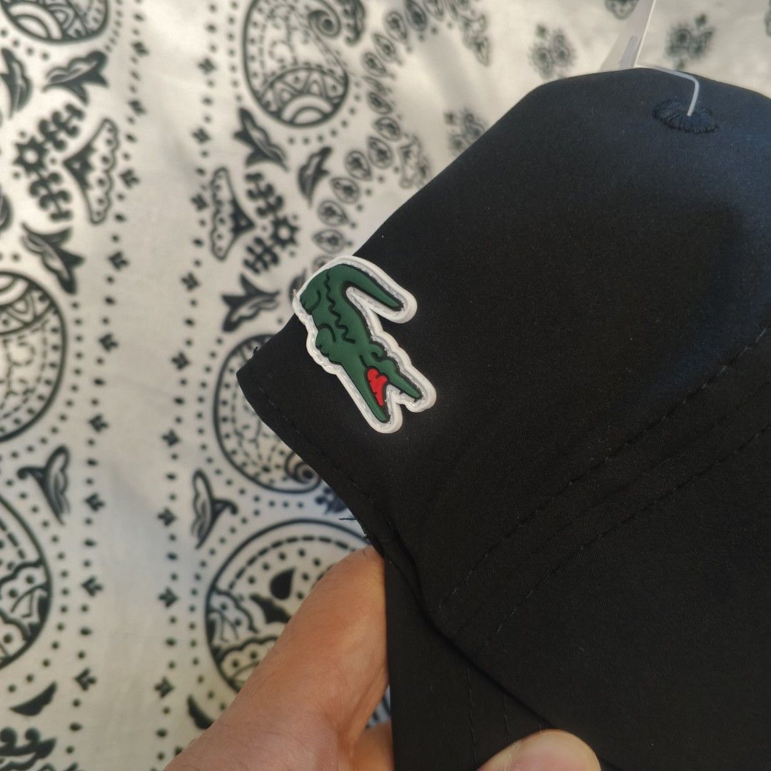 Lacoste cap (Category: Caps & Hats) located in Manila. Submitted by janna_m (Listing ID 1462839969, Image 3). Description: Djokovic Novak Drifit tennis cap (black) EXCELLENT CONDITION ✅ NO ISSUES ✅ DM FOR INQUIRIES 📩.