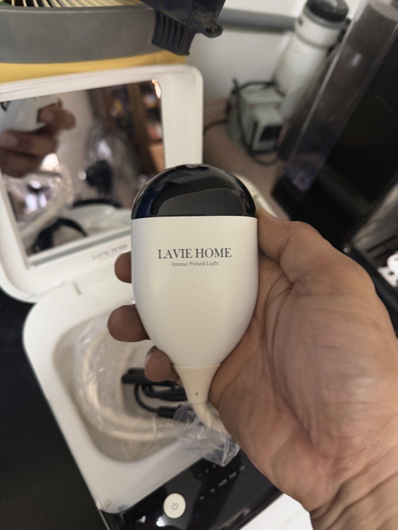Lazer Hair Remover (Category: Other Home Appliances) located in Bulacan. Submitted by mysticdeer.6d7f47 (Listing ID 1462685359, Image 3). Description: The image shows a LAVIE Home Intense Pulsed Light (IPL) hair removal system, which is an at-home beauty device designed for hair reduction and skin care treatments..