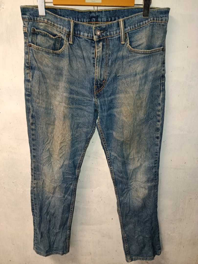 Levi's 511 Slim Fit Jeans (Category: Jeans) located in Nabunturan. Submitted by marmitoren42236 (Listing ID 1462692370, Image 2). Description: - Classic blue Levi's 511 jeans - Slim fit style - Vintage look with signs of wear - Button fly closure - Two front pockets and two back pockets - Perfect for casual outfits.