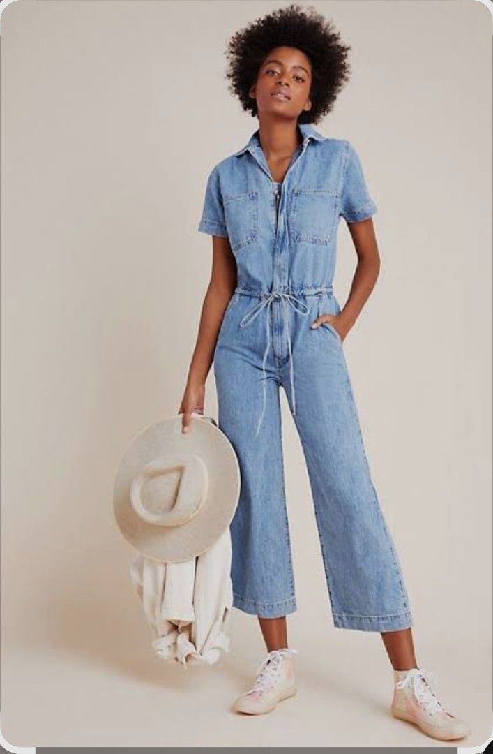 Levi's Denim Jumpsuit (Category: Jumpsuits) located in Quezon City. Submitted by preloved_by_mariekondo (Listing ID 1462835427, Image 1). Description: Levi's Short Sleeve Denim Jumpsuit Classic relaxed straight-leg silhouette, a front zip fastening, short sleeves, practical chest patch pockets, and an adjustable drawstring or tie at the cinched waist. Size Small, can fit Medium Model in picture is tall, like 5'9". For someone 5'2" pant leg is rig