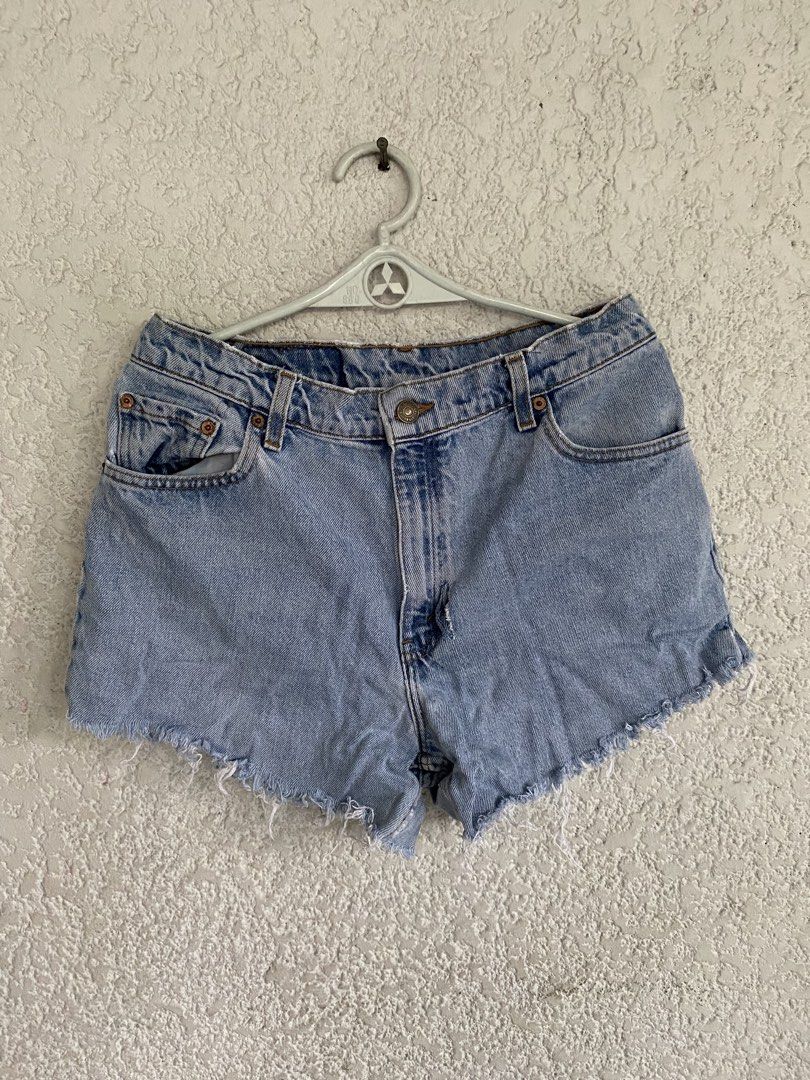 Levi's Light Wash Denim Cutoff Shorts (Category: Shorts) located in Paranaque City. Submitted by dessells_ (Listing ID 1462759012, Image 1). Description: - Classic light wash Levi's denim shorts - Frayed hem for a casual vibe - Button fly closure - Two back pockets with signature Levi's stitching - measurement laid flat- waist- 15 inches - please check photos for the shorts comdition - Gcash/ J&T - shipping from Paranaque.
