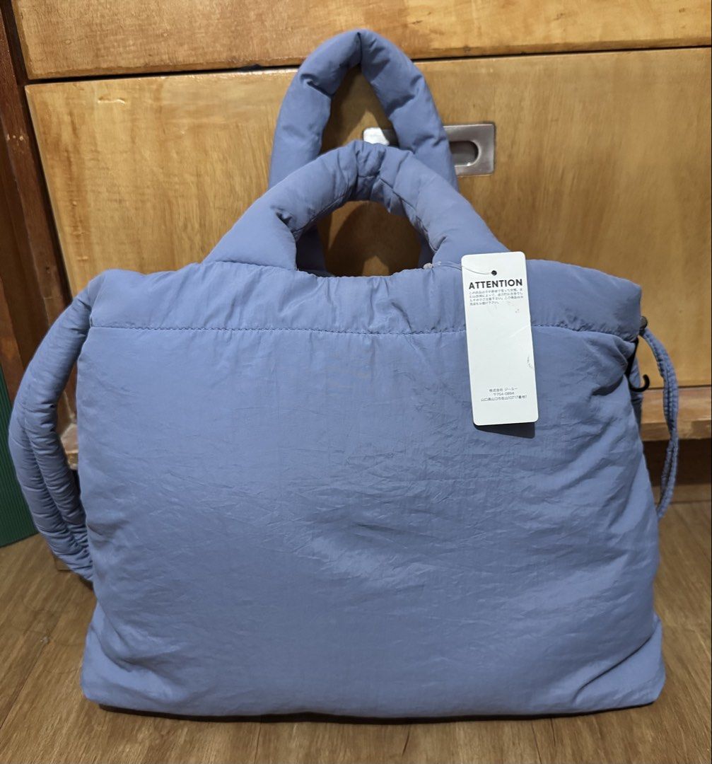 Light Blue Puffer Tote Bag (Category: Tote Bags) located in Manila. Submitted by jrc1994 (Listing ID 1462868430, Image 1). Description: - Adorable puffy tote bag - Chic light blue color - Very spacious interior - Convenient front pocket - Secure drawstring closure - Comfortable padded handles - Ideal for everyday errands or travel - Comes with original tag attached -RSF decluttering -LP 800.