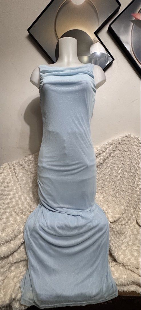 Light Blue Ruched Bodycon Maxi Dress (Category: Dresses) located in Marikina City. Submitted by lorradel (Listing ID 1462745914, Image 1). Description: -L: 58in - fits Xs-S - Light blue maxi dress - Ruched bodycon fit - Cowl neck - Mermaid-style hem - Subtle textured fabric - Sleeveless - Ideal for formal events or a night out - MAY HAVE some washable stains (hindi maiiwasan) needs washing; had been stored - mannequin size 34-26-34 - mannequin’s 