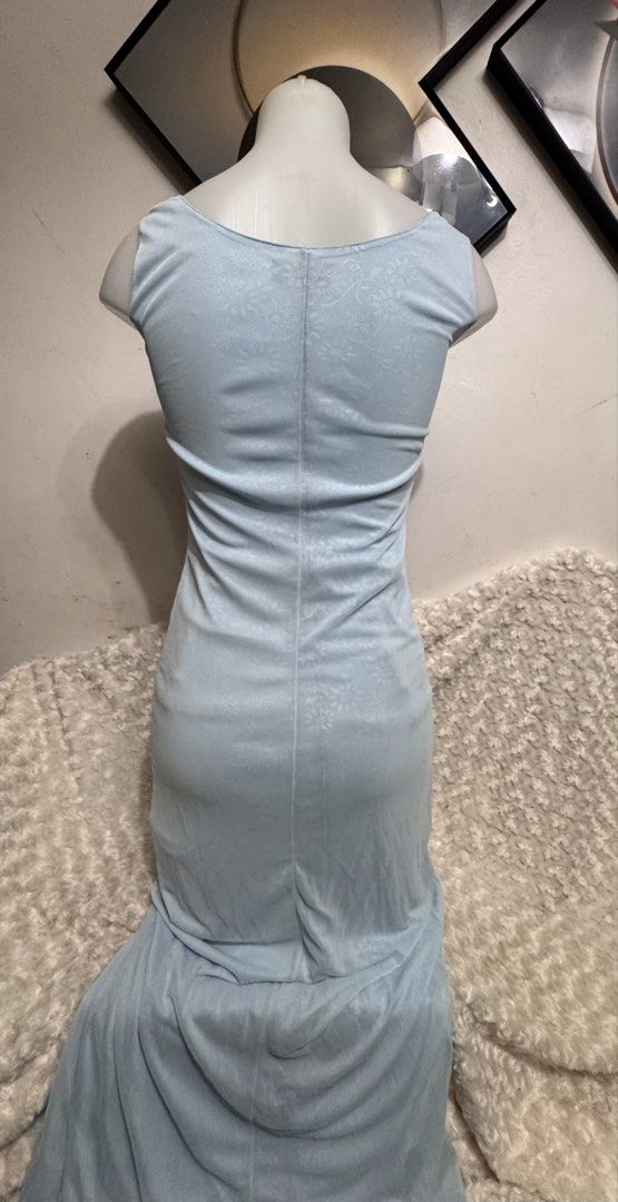 Light Blue Ruched Bodycon Maxi Dress (Category: Dresses) located in Marikina City. Submitted by lorradel (Listing ID 1462745914, Image 3). Description: -L: 58in - fits Xs-S - Light blue maxi dress - Ruched bodycon fit - Cowl neck - Mermaid-style hem - Subtle textured fabric - Sleeveless - Ideal for formal events or a night out - MAY HAVE some washable stains (hindi maiiwasan) needs washing; had been stored - mannequin size 34-26-34 - mannequin’s 