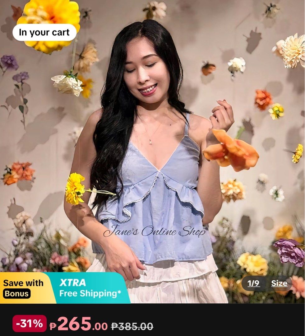 Light Blue Ruffled Camisole Top with Adjustable Straps (Category: Sleeveless) located in Manila. Submitted by sammmm777 (Listing ID 1462768958, Image 2). Description: - 32A-34B bust - Adorable light blue camisole top - Features charming ruffles on neckline and hem - Garterized back ensures a snug and comfortable fit - Adjustable straps for a customized fit - Versatile piece for casual outings or dressing up.