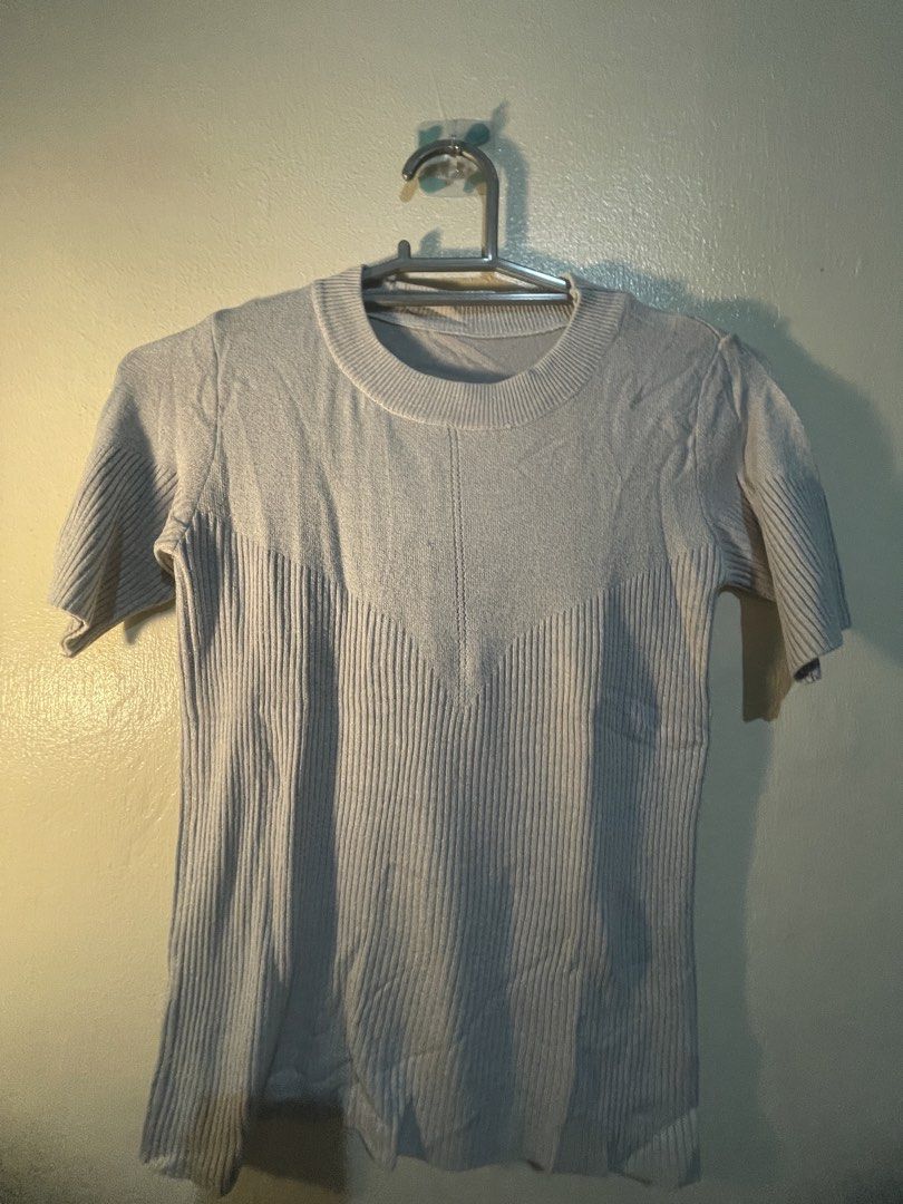 Light Grey Ribbed Knit Short Sleeve Top (Category: Blouses) located in Manila. Submitted by sammmm777 (Listing ID 1462815394, Image 2). Description: - Light grey short sleeve top - Ribbed knit fabric with vertical ribbing - Round neckline.