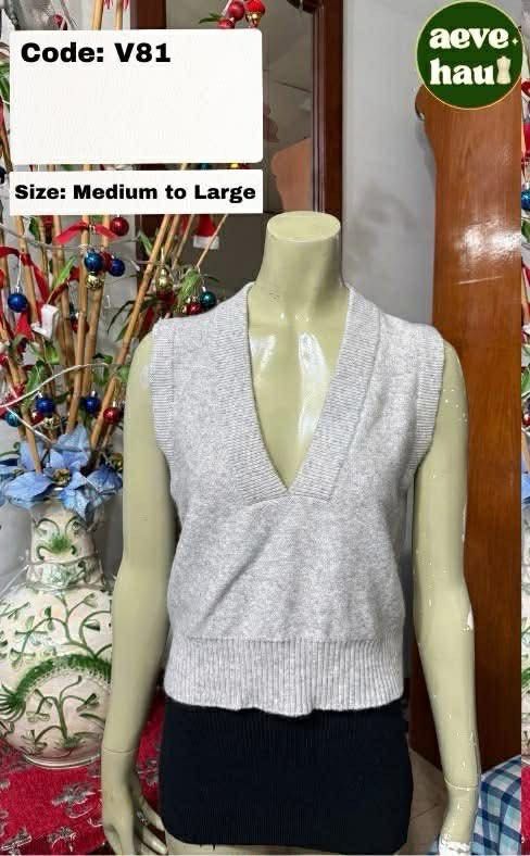 Light Grey V-Neck Knit Vest (Medium to Large) (Category: Sleeveless) located in Manila. Submitted by thriftcycle.mnl (Listing ID 1462720926, Image 1). Description: - Light grey knit vest - V-neckline - Sleeveless - Ribbed hem - Fits Medium to Large - Ideal for layering - Item Code: V81.