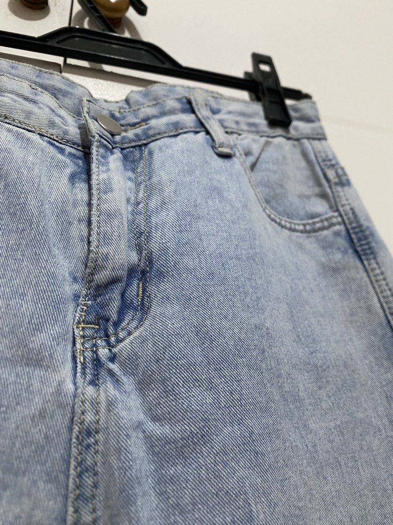 Light Wash Wide Leg Jeans with Side Slits (Category: Jeans) located in Quezon City. Submitted by addy_addy (Listing ID 1462820931, Image 3). Description: - Light wash denim - Wide leg cut with a slight flare - Side slits on each leg - Classic five-pocket styling - Button and zip fly closure - Ideal for casual outfits - Approximate measurements * Waistband: 27 inches * Length: 36.5 inches * Inseam: 25 inches * Front rise: 11 inches * Hips: 35.5 in