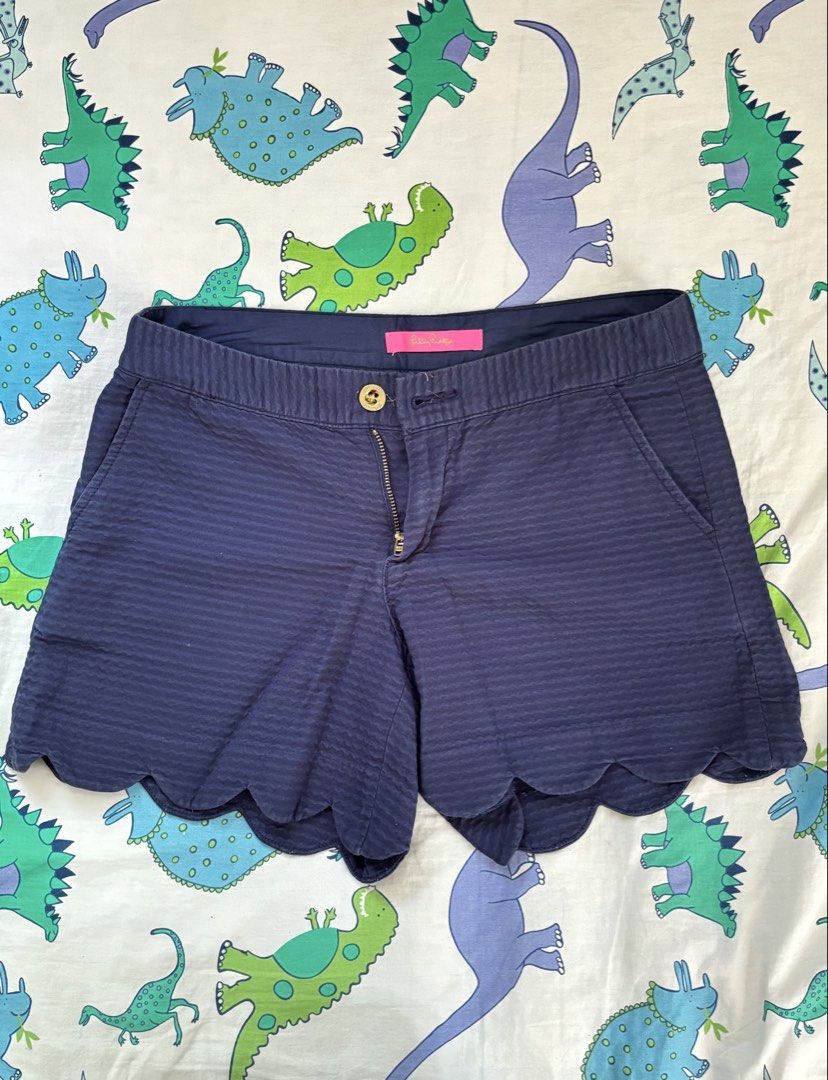 Lilly Pulitzer Navy Blue Hem Shorts Size 2 (Category: Shorts) located in Paranaque City. Submitted by ggg.bin (Listing ID 1462784006, Image 1). Description: - Brand: Lilly Pulitzer - Color: Navy Blue - Size: 2 - Fabric: Textured Seersucker - Features: Scallop hem, two back pockets - Origin: Made in Sri Lanka.