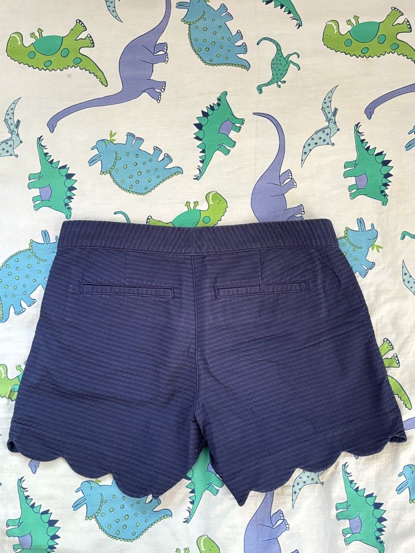 Lilly Pulitzer Navy Blue Hem Shorts Size 2 (Category: Shorts) located in Paranaque City. Submitted by ggg.bin (Listing ID 1462784006, Image 2). Description: - Brand: Lilly Pulitzer - Color: Navy Blue - Size: 2 - Fabric: Textured Seersucker - Features: Scallop hem, two back pockets - Origin: Made in Sri Lanka.
