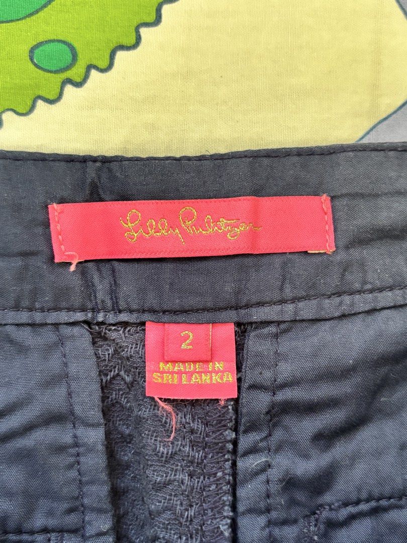 Lilly Pulitzer Navy Blue Hem Shorts Size 2 (Category: Shorts) located in Paranaque City. Submitted by ggg.bin (Listing ID 1462784006, Image 3). Description: - Brand: Lilly Pulitzer - Color: Navy Blue - Size: 2 - Fabric: Textured Seersucker - Features: Scallop hem, two back pockets - Origin: Made in Sri Lanka.