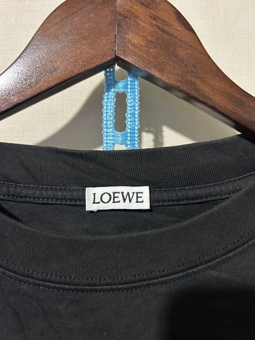 LOEWE embroidered tee (Category: Luxury Apparel) located in Santa Rosa. Submitted by unexpected.finds4026 (Listing ID 1462877769, Image 2). Description: Large on tag 24 W 28 L Best fit to L- XL complete tags heavy cloth 9.5/10 color rate no flaws .