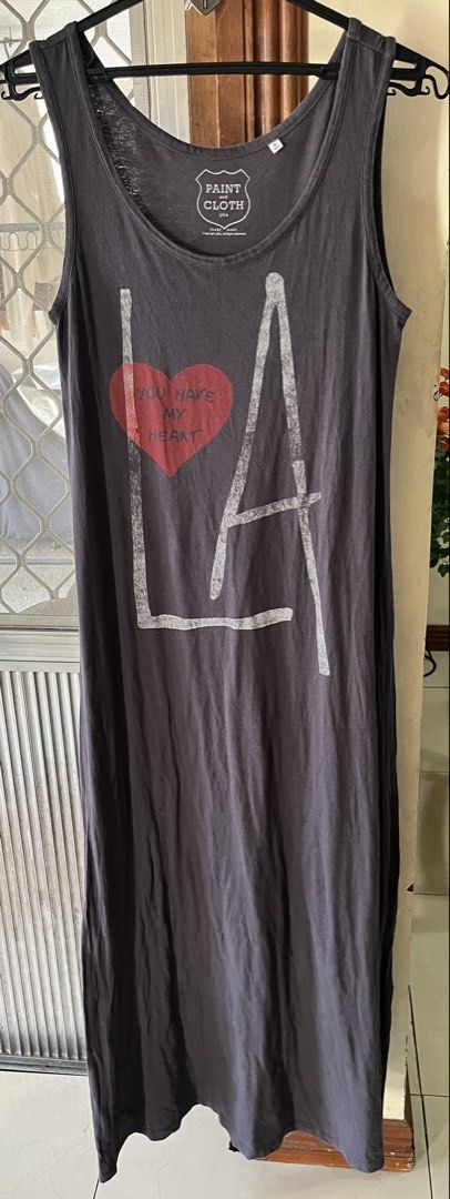 Long dress (Category: Dresses) located in Bacoor. Submitted by ayit. (Listing ID 1462703461, Image 1). Description: Small-med fit - Japan brand long dress - Size: Small (EU 36 / UK 8 / US 4) - Color: Dark Gray - Design: "LA" graphic with heart and text "You Make My Heart" - Style: Sleeveless, relaxed fit - Material: Soft and comfortable fabric - Condition: Very good - Perfect for casual wear.