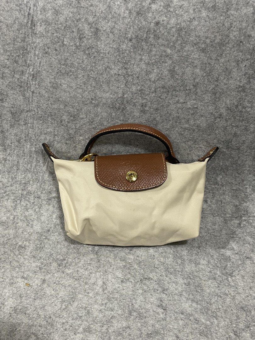 longchamp (Category: Shoulder Bags) located in Calamba. Submitted by thriftingoverload (Listing ID 1462683544, Image 3). Description: plus shipping fee.