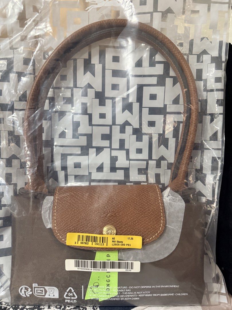 LONGCHAMP LE PLIAGE LONG HANDLE Medium (Category: Luxury Bags & Wallets) located in Paranaque City. Submitted by olceastore.24 (Listing ID 1462791556, Image 2). Description: 🤎 FOR SALE | LONGCHAMP LE PLIAGE LONG HANDLE 🤎 💯 Guaranteed Authentic ✨ Brand: Longchamp 👜 Model: Le Pliage Long Handle 🎨 Color: Ebony / Brown 📌 Condition: Brand New / Unused 📦 Inclusions: Original packaging A timeless and versatile Longchamp bag perfect for everyday u