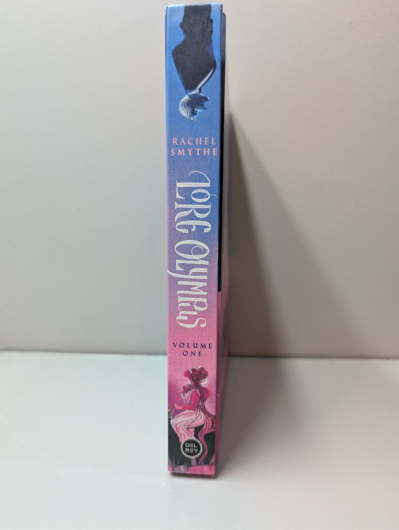 Lore Olympus Volume One by Rachel Smythe Webtoon Comic (Category: Comics & Manga) located in Cavite. Submitted by mikaelhope (Listing ID 1462728111, Image 3). Description: Condition: Used. The binding is tight and the full color pages are pristine. Authentic copy bought from Fully Booked with the original price tag still on the back cover. Inclusions: Volume 1 hardcover only..